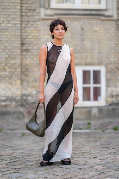 The trend was also seen outside the runway shows of the world's major fashion weeks. In this photo, influencer Alicia Coscarelli wears a naked dress during the Copenhagen Fashion Week in August.