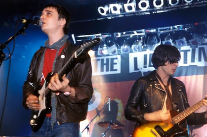 Pete Doherty and Carl Barat performing live onstage