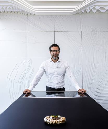 Michelin-starred chef Quique Dacosta inside his lab in Dénia, where he has prepared a dish of rice and moray eel.