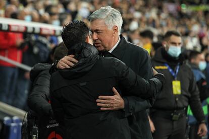 Ancelotti y Xavi.