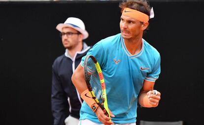 Nadal celebra un punto ante Djokovic.