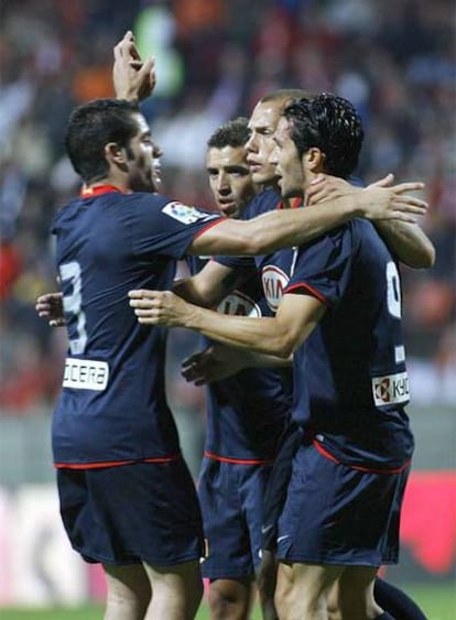 Jugadores del Atletico de Madrid celebran el tanto del empate