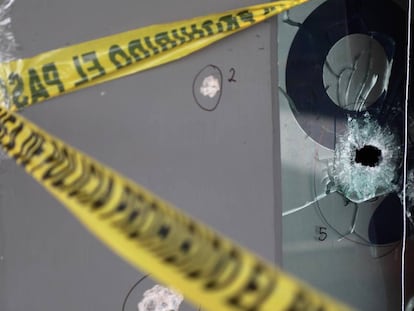 Bullet holes left after a gunman opened fire in a bar in Culiacán.