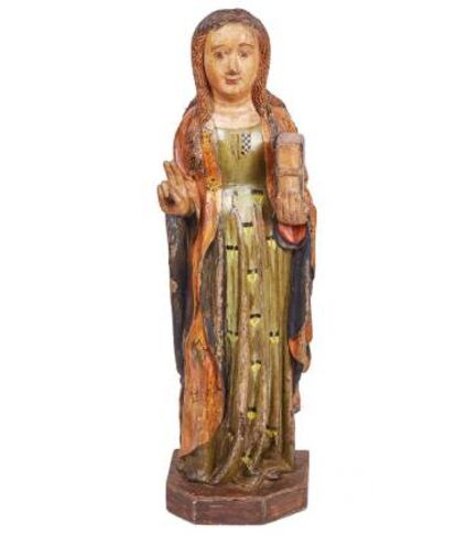 La santa con los escudos de Pere II en el pecho y la casa de Entença en la falda.