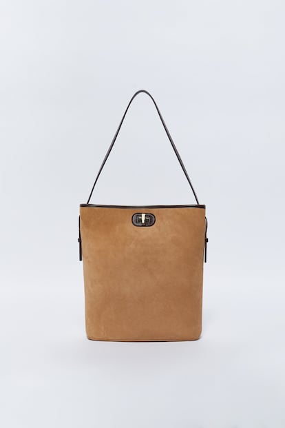 Sfera offers a sure bet with this stylish suede-effect bag with contrasting black touches. Perfect to wear with everything. €32.99.