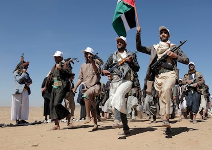 Houthi fighters march during a rally of support for the Palestinians in the Gaza Strip and against the U.S. strikes on Yemen outside Sanaa on Jan. 22, 2024.