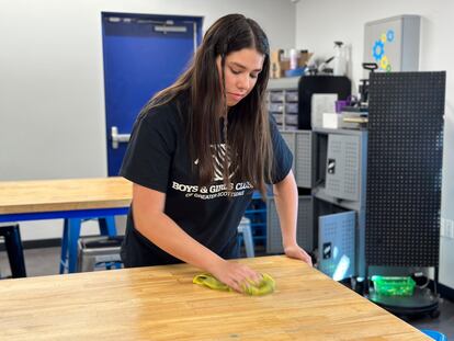 Addison Beer, 17, prepares for summer campers arriving next week at the Virginia G. Piper branch of the Boys & Girls Club where she works, on May, 25, 2023 in Scottsdale, Arizona.