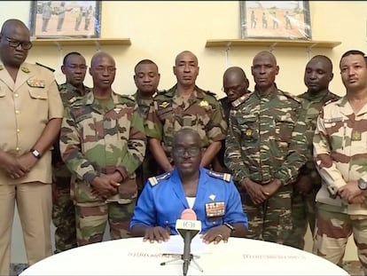 Niger Army spokesman Colonel Major Amadou Adramane speaks during an appearance on national television, after President Mohamed Bazoum was held in the presidential palace, in Niamey, Niger, July 26, 2023 in this still image taken from video.