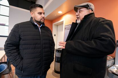 Guillermo Lopez Jr., right, talks with Raymond Santiago, executive director, Hispanic Center Lehigh Valley, left, on Jan. 18, 2024, in Bethlehem, Penn.