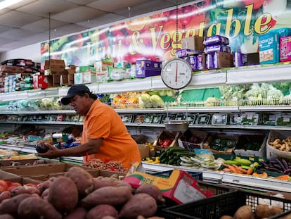 A man shops for produce at Best World Supermarket in the Mount Pleasant neighborhood of Washington, D.C., U.S., August 19, 2022.
