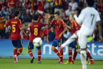 Juanfra, Xavi, Villa e Iniesta celebran un gol en un amistoso de 2012.