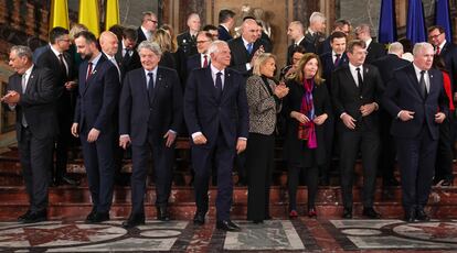 Participants pose for a family photo during an informal meeting of European Defense Ministers in Brussels