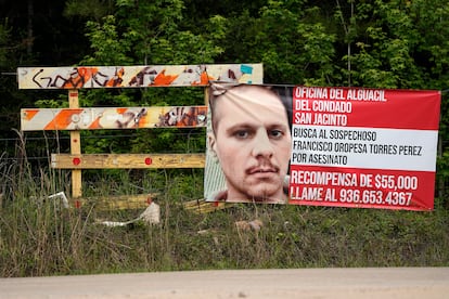 posted wanted sign for a mass shooting suspect is shown in Cleveland, Texas