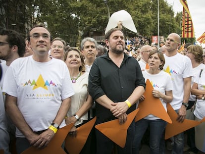 Oriol Junqueras, en el centro, en una manifestación independentista, junto a Carme Forcadell y Raül Romeva (a su izquierda).