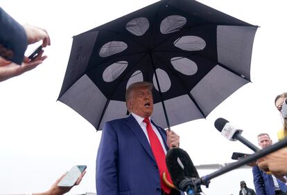 Former President Donald Trump speaks before he boards his plane at Ronald Reagan Washington National Airport, Thursday, Aug. 3, 2023, in Arlington, Va., after facing a judge on federal conspiracy charges that allege he conspired to subvert the 2020 election.