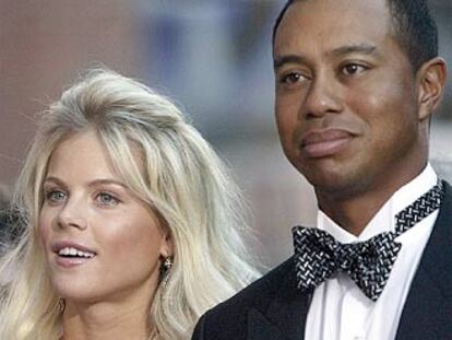 El jugador de golf Tiger Woods y su novia