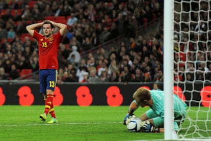 Juan Mata despairs as England goalkeeper Joe Hart collects his effort.