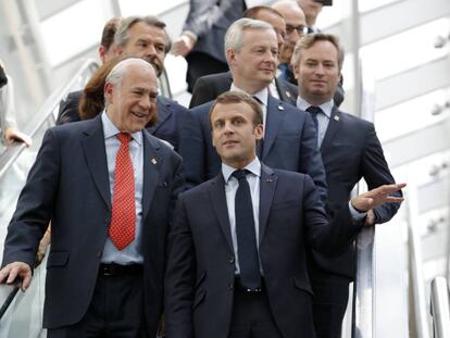 El presidente francés, Emmanuel Macron, y el secretario general de la OCDE, Ángel Gurría