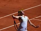 Russia's Anastasia Pavlyuchenkova serves the ball to Slovenia's Tamara Zidansek during their women's singles semi-final tennis match on Day 12 of The Roland Garros 2021 French Open tennis tournament in Paris on June 10, 2021. (Photo by MARTIN BUREAU / AFP)