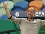 Manchester City's head coach Pep Guardiola reacts during the Champions League quarterfinal soccer match between Lyon and Manchester City at the Jose Alvalade stadium in Lisbon, Portugal, Saturday, Aug. 15, 2020. (Miguel A. Lopes/Pool via AP)