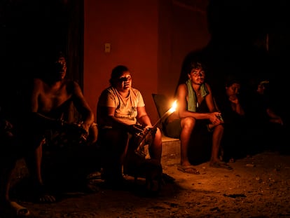 Residents of Pie de la Cuesta stand guard outside their homes to prevent looting on November 1.