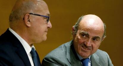 Michel Sapin y Luis de Guindos, en Madrid.