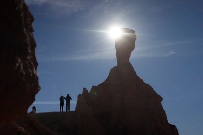 People watch a rare "ring of fire" eclipse of the sun at Bryce Canyon National Park, Utah.