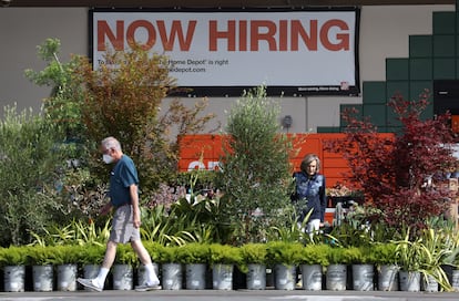 A "now hiring" sign at a Home Depot store in San Rafael, California.