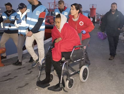 Migrants are assisted by the Red Cross at the port of Motril, in Granada, on Sunday.