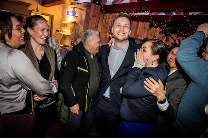 The leader of Demokraatit, Jens-Frederik Nielsen, reacts during the election party  in Nuuk on March 12.