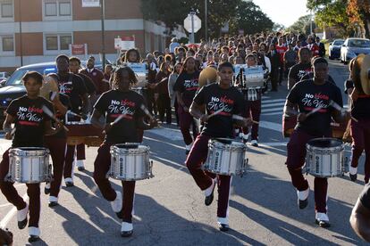 A student band from North Carolina Central University marches to a polling place to cast their ballots on the first day of early voting in the state on Oct. 18.