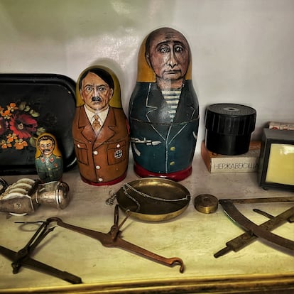 War is no stranger to this stand at Pochaina flea market, which is selling a set of traditional matryoshkas representing, in this order, Russian President Vladimir Putin, Nazi leader Adolf Hitler and Soviet leader Joseph Stalin.