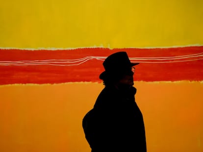 A visitor viewing 'No. 5' by Mark Rothko at the artist's retrospective at the Louis Vuitton Foundation in Paris.