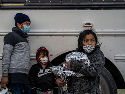 Migrants from Central America hand themselves over to US border control in La Joya, Texas.