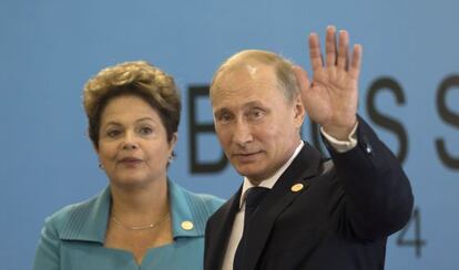 Putin e Rousseff durante a c&uacute;pula dos BRICS.