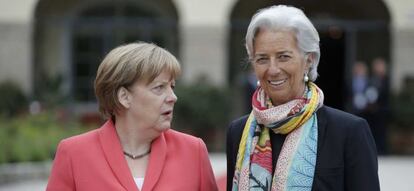 La canciller alemana Angela Merkel (izquierda) junto a la directora gerente del FMI, Christine Lagarde.