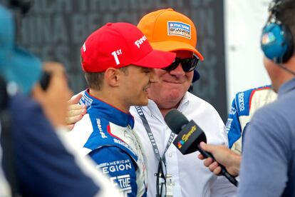 Alex Palou, left, is congratulated by team owner Chip Ganassi after winning the IndyCar auto race at Mid-Ohio Sports Car Course in Lexington, Ohio, Sunday, July 2, 2023. 