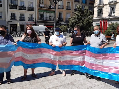 Varios representantes de colectivos LGTBI, este lunes en la plaza de Pedro Zerolo, en el barrio madrileño de Chueca.