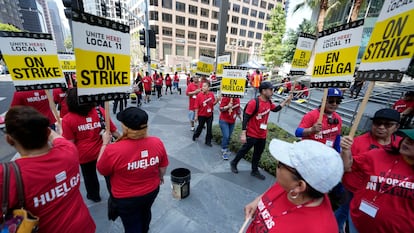 Striking hotel workers rally outside the Intercontinental Hotel after walking off their job early Sunday, July 2, 2023, in downtown Los Angeles.