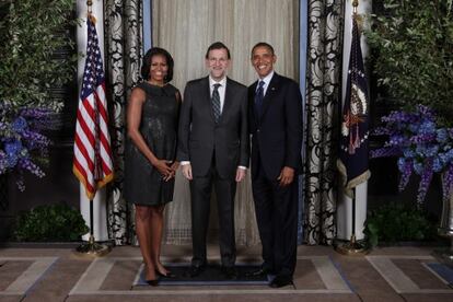 Mariano Rajoy, con el matrimonio Obama en la recepci&oacute;n de la Asamblea General de la ONU.