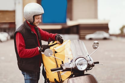 Courier,On,Scooter,Opening,Yellow,Food,Delivery,Bag,Standing,Outside