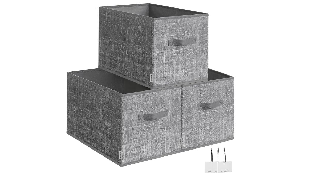 Juego de tres cajas de almacenamiento plegables.