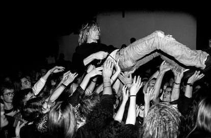 Fans raise Kurt Cobain up at a Nirvana concert in Frankfurt in 1991.