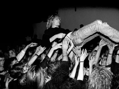 Fans raise Kurt Cobain up at a Nirvana concert in Frankfurt in 1991.