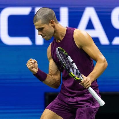 Aug 25, 2025; Flushing, NY, USA; Carlos Alcaraz of Spain in action against Reilly Opelka of the United States in the first round of the men’s singles at the US Open at Arthur Ashe Stadium in Billie Jean King National Tennis Centre. Mandatory Credit: Mike Frey-Imagn Images