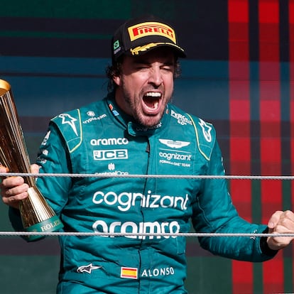 Formula One F1 - Brazilian Grand Prix - Jose Carlos Pace Circuit, Sao Paulo, Brazil - November 5, 2023
Aston Martin's Fernando Alonso celebrates with a trophy on the podium after finishing third place in the Brazilian Grand Prix REUTERS/Amanda Perobelli