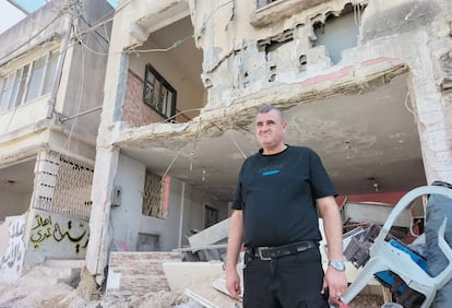 Samer Yaber, in front of the bombed-out house of his son Abu Shujaa, in Nur Shams, August 31.