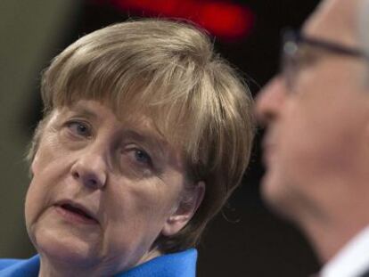 Angela Merkel i Jean-Claude Juncker compareixen davant la premsa a Brussel·les.