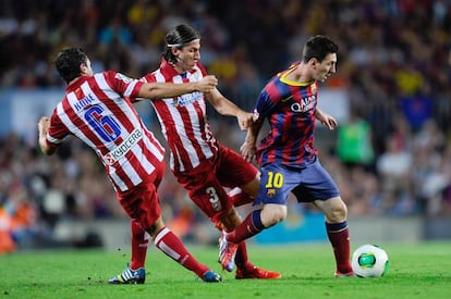 Messi seguido de Koke y Filipe Luis.
