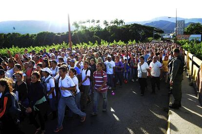 Hundreds of people crossed into Colombia from Venezuela on Sunday.